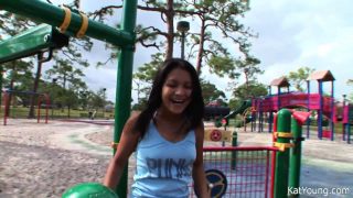 Kat Young teases her webcam viewers while she climbs at the playground