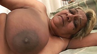 Fatty granny boned deep in her cunt in a doggy position