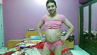 Cute pink princess sissy crossdresser femboy Sweet Lollipop in a top and pantie.