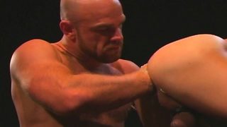 Three musclemen get down for a nasty round of cocksucking and fist fucking