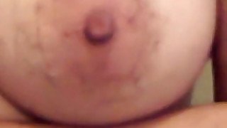 Chubby amateur chick shows off her huge saggy tits and plump belly