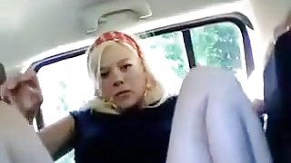 Scandinavian yellow haired in her car