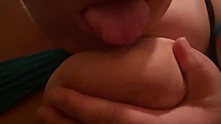 Licking and sucking my big juicy nipples