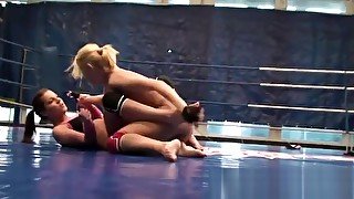 Alluring euro wrestles on the floor