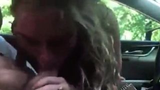 Excited Blonde Blowing In A Car