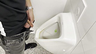 Playing with piss in the toilet