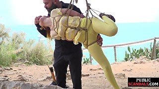 Public whore suspension bondage exposed with buttplug in ass