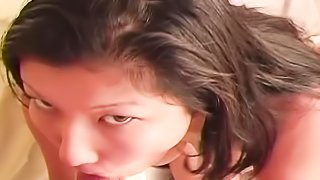 Big Asian titties get bounced around as chubby whore sucks dick for cum