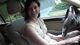 Pretty brunette masturbates in the car during driving