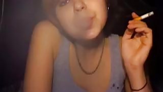 Cute emo immature smokes a fag on webcam