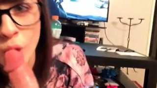 Brunette cute girl with glasses gives a nice blowjob