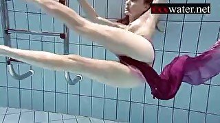 Smoking hot Russian redhead in the pool