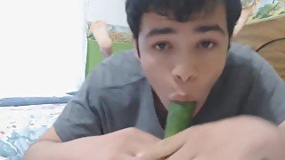 gay with nice ass being fucked by a cucumber