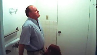 Bathroom slut sucks dick in restroom