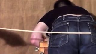 Caned over tight jeans Daddy boy