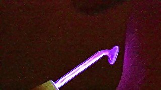 close up neon wand zaps