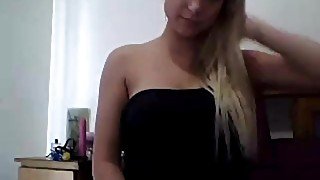 Pregnant girl rubs her pussy in front of a webcam