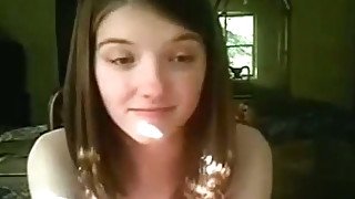 Short haired teen brunette with pretty face masturbates her fresh pussy