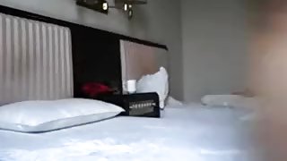 Chinese non-professional couple in hotel