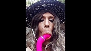 Transgender anal masturbation in garden