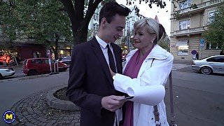 Mature blonde MILF Margaux M. picks up a younger guy on the street