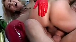 Whorish blonde gets double penetration in her pussy and in her ass