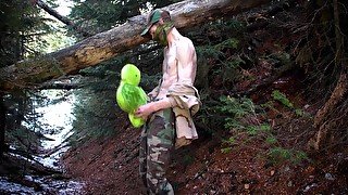 Soldier Banging Plushie In The Rocky Mountain Forest During Winter In Dark Canyon Surrounded By Fallen Trees. 11 Min