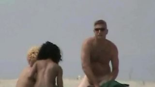 Candid beach camera filmed a horny nudist