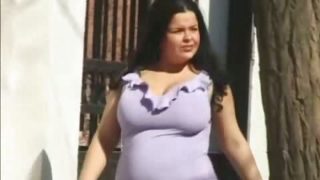 Busty whore pisses outdoor