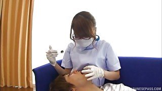 Busty Japanese doctor treats guy with different treatment