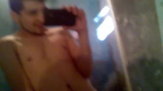 Latin boy jerking off in the bathroom and show cum shot