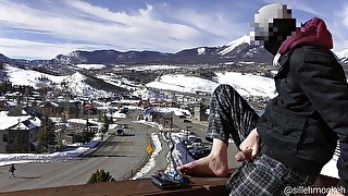 Showing off and cumming on a balcony overlooking main street