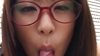 Mimi Kousaka with specs licks hard penis