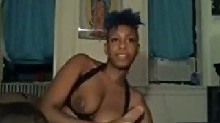 Busty ebony whore sucking white ice-cream in dirty porn clip