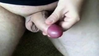 Pulling back the foreskin of my uncut cock