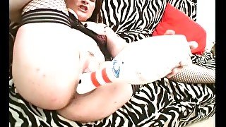 bowling pin deep in her pussy