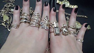 Golden jewelry and hand fetish