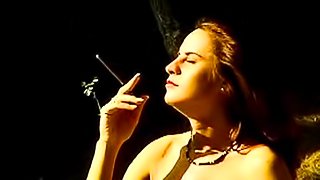 Smoking beauty poses outside