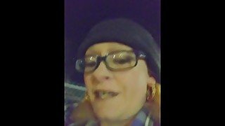 Sexy Smoking Milf in glasses walking the city