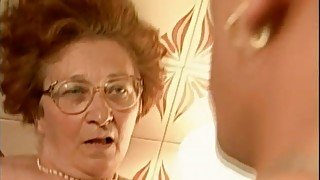 Cocksucking granny fucked in her hairy pussy