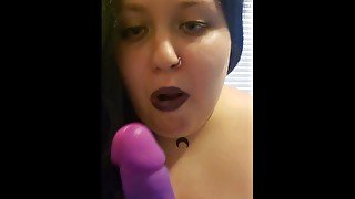 Milf sucking thick dildo