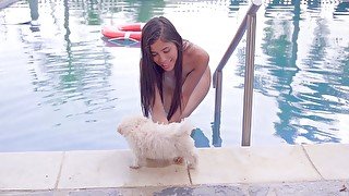 Slender Latin girl Karin Torres takes off bikini and shows off her pussy by the pools side