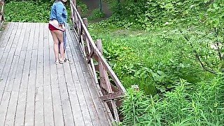 Stand peeing from bridge