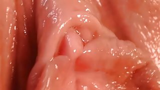 Close up of hot pink wet pussy and clit