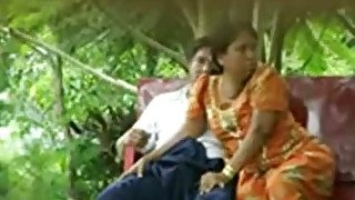 Spy cam video of chubby Desi woman riding and sucking cock outdoors