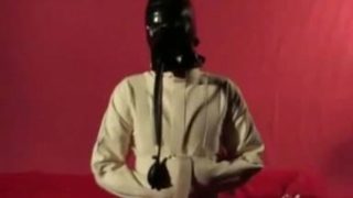 Girl In Black Latex Catsuit Mask With Straightjacket A Gagged Breath Play