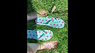 Cute feet playing in the grass