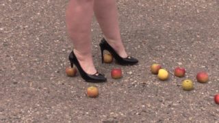 Crush fetish outdoors  Fat legs in high heel shoes crush apples