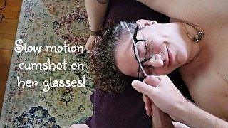 Slow motion cumshot on her glasses!