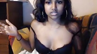 Dark skin teen oils her tits